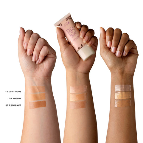 100% Pure Cosmetics BB Cream swatches on different skin tones.