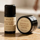 MUKTI Bioactive Renewal Queen of the Night & Day Serum Mini Kit freebie, a small serum bottle beside a small cream tub, styled shot