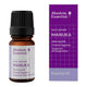 Manuka essential oil bottle and packaging with 'Absolute Essential' branding on a white background.
