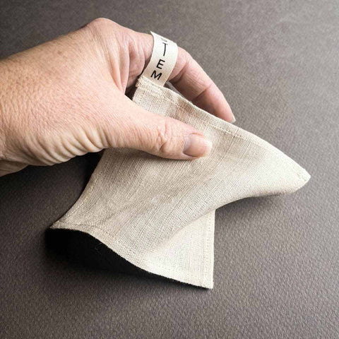 Lotus silk face cloth - beige textured fabric.