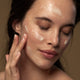 Model applying avocado pear collagen boosting night cream.