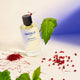 50ml bottle Bastille Bataille Perfume, natural vegan perfume styled with saffron and leaves.