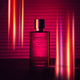 100ml bottle Bastille Paradis Nuit Perfume, natural vegan perfume styled with a hot pink background.