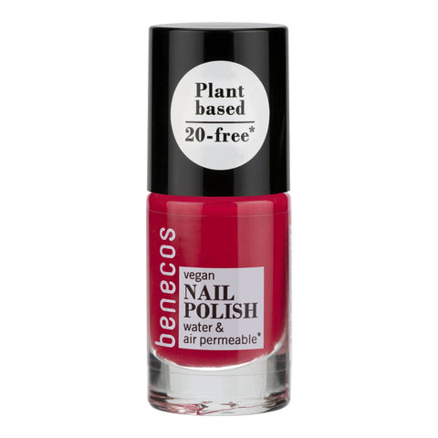 Benecos vegan nail polish bottle with red polish and black cap on a white background.