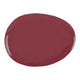 Round maroon nail polish swatch on a white background.