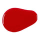 Red gel-like substance on a white background.