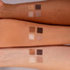 Benecos Natural Quattro Eyeshadow Coffee & Cream 4.8g swatches of the four shades on a person's forearms, close up of the arm