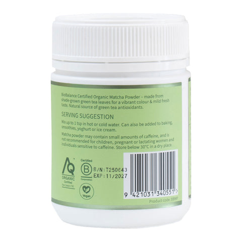 Container of organic matcha powder with label and barcode on a white background