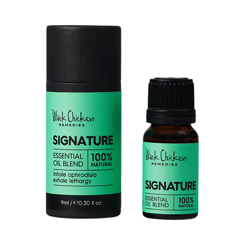 Black Chicken Remedies Essential Oil Blend Signature 9ml bottle standing beside its black cylinder box, front view on a plain white background