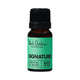 Black Chicken Remedies Essential Oil Blend Signature 9ml in an amber bottle with a black cap and a green label, front view on a plain white background