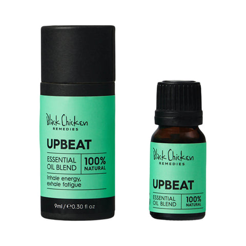 Black Chicken Remedies Essential Oil Blend Upbeat 9ml bottle standing beside its black cylinder box, front view on a plain white background