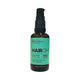 Black Chicken Remedies HairOM Hair & Scalp Oil 50ml in a dark glass pump bottle with a mint green label, front view on a plain white background