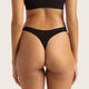Boody G-String Black lifestyle back view of a person wearing the black g-string and a black top, styled lifestyle photo, single image