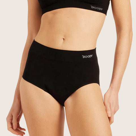 Boody Period & Leak Proof Full Briefs Light-Moderate Black lifestyle close up of a person's waist and hips wearing the black full briefs