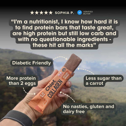 Protein bar being held with promotional text and a scenic background