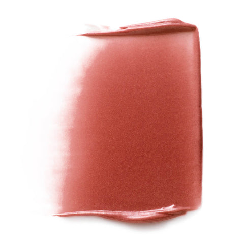 Dr Hauschka Lip to Cheek Tint in 01 Apricot shade swatch, a cream blush stick that also works as lipstick. Formula includes rose petals, almond oil and anthyllis to support and hydrate all skin conditions.