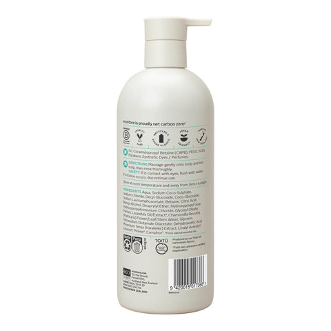 Back of baby body wash & shampoo in a white bottle with pump on a white background.