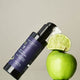 Edible Beauty No. 1 Belle Frais Cleansing Milk on an apple