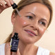 woman using No. 3 Exotic Goddess Ageless Serum