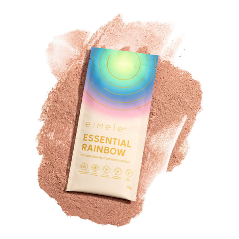 eimele Essential Rainbow sachet on top of its contents, daily superfood powder.