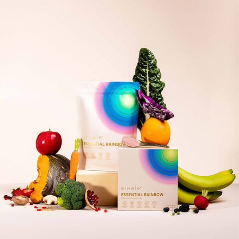 eimele Essential Rainbow pouch and box styled with vegetables.