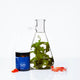eimele Optimal Omega+ jar styled with capsules and flask bottle.