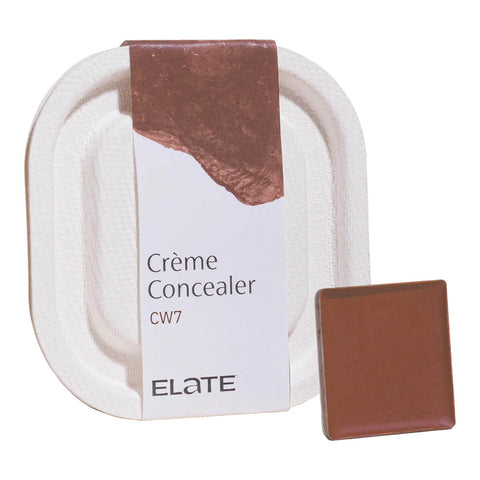 2.7ml pan of Elate Beauty Creme Concealer in the shade 'CW7', for deep warm skin tones. A two-in-one concealer and illuminator formulated with evening primrose oil, designed to heal and conceal blemishes.