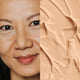 Elate Beauty Refresh Foundation 30ml RN2 lifestyle split image of a smiling woman with light medium skin beside a swatch of light golden foundation