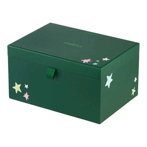 A dark green rectangular storage box with a lid, decorated with small pastel star stickers in pink, yellow, and white. The brand name 'endota' is printed in light green on the top lid.