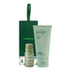 Endota Signature Blend Hand Therapy gift set featuring a dark green box with a carrying loop, a pale mint hand cream tube, and a small essential oil bottle on a white background.