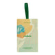 Endota lip duo packaged in a rectangular hanging box with a green ribbon loop. The packaging features a pastel design with abstract floral elements in yellow, orange, and teal on a light green background with small pink hearts.