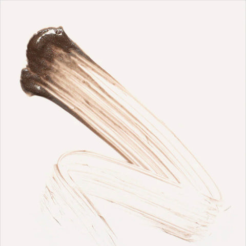 Ere Perez Argan Brow Hero Perfect 3.5ml swatch, a stroke of dark brown brow gel, close up on a plain white background, clear product photo