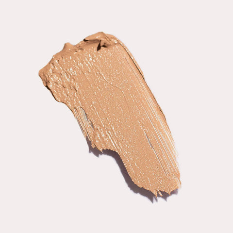 Ere Perez Arnica All-Cover Pot Chai swatch, a swipe of tan beige concealer, close up of the texture, clear product photo, single image