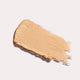 Ere Perez Arnica All-Cover Pot Honey swatch, a swipe of light golden beige concealer, close up of the texture, clear product photo
