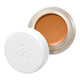 Ere Perez Arnica All-Cover Pot Mocha 5g, an open white pot with its lid beside it showing deep orange brown concealer, front view on white