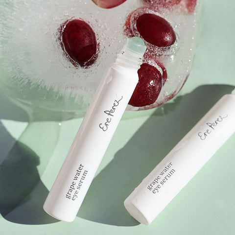 8ml Ere Perez Grape Water Eye Serum with a jade roller applicator.