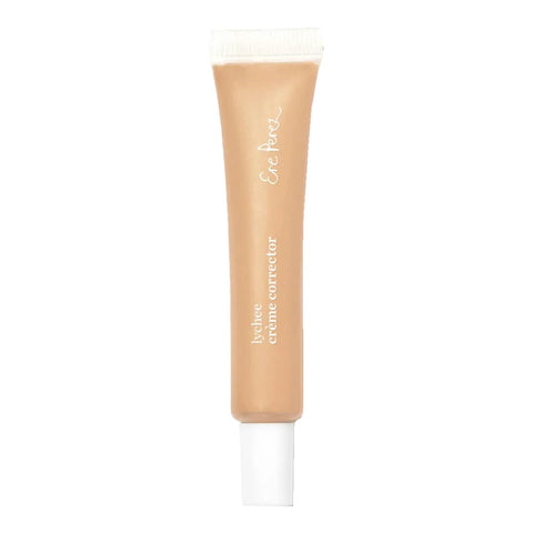Ere Perez Lychee Crème Corrector 10ml Cuatro in a slim tube with a white base, showing a warm tan tint, standing upright on a plain white background
