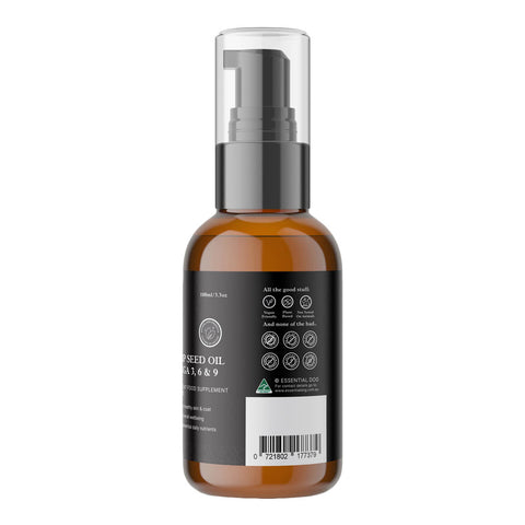 Essential Dog Hemp Seed Oil for Dogs Omega Food Supplement 100ml amber bottle turned to show the side of the label with small print on white