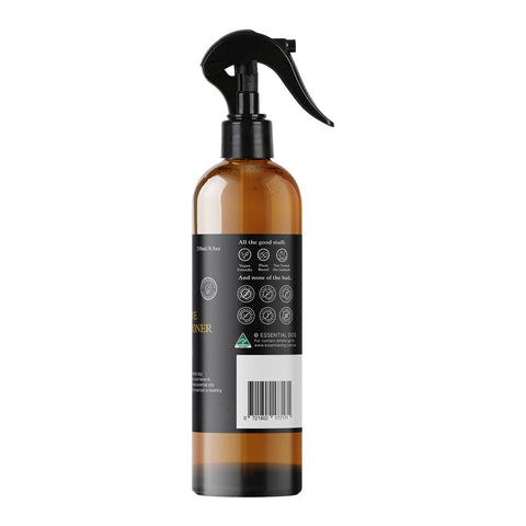 Brown spray bottle with black nozzle on a white background.
