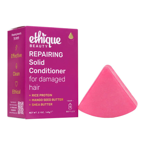 Ethique Purple Solid Conditioner for Damaged Hair 60g box next to pink bar.