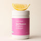 Pink supplement container labeled 'Gut Restore Prebiotic Collagen' 260g from Frank Simple with a lemon wedge on a beige background.