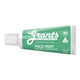 Green mini travel-size tube of Grants Mild Mint Natural Toothpaste.