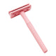 Pink safety razor on a white background.