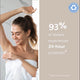 Woman applying deodorant with text about product effectiveness on a beige background. 24 hour protection. 