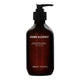 Grown Alchemist Hydra-Restore Shampoo 300ml in a dark amber pump bottle with a black pump, front view on a plain white background