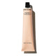 Hand cream tube of Grown Alchemist Rich Restorative Hand Cream 65ml with black cap with a shadow on a white background.