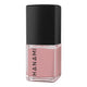 Pink nail polish bottle with black cap on a white background