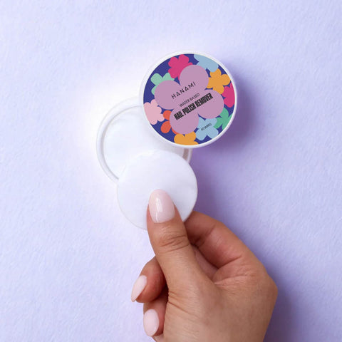 Hanami water based nail polish remover on a purple background.