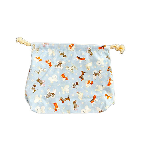 hannah Waterproof Wet Bag Blue Doggos, a pale blue drawstring bag printed with small brown dogs on a plain white background, clear product photo