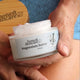 Honest Skincare Magnesium Butter 150ml lifestyle shot of two hands holding the open jar of butter, styled lifestyle photo, single image